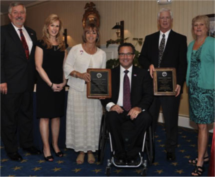 Left to right: NISH COO Dennis Fields, Committee COO Kimberly Zeich, Honoree Gidget Hopf, Chairperson Andrew D. Houghton, Honoree Rich Gilmartin, and NIB COO Scottie Knott 